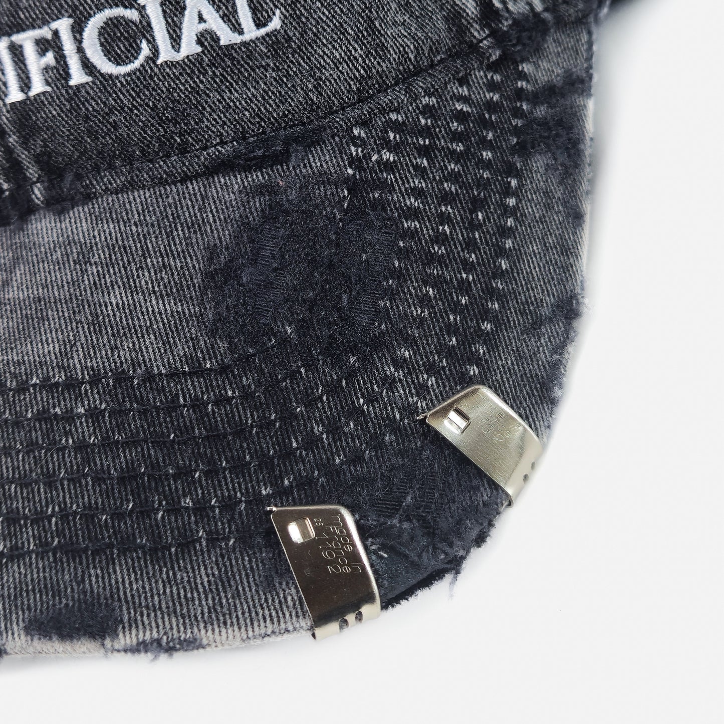 UGLY, ANXIOUS AND ARTIFICIAL HAT: BRUISED